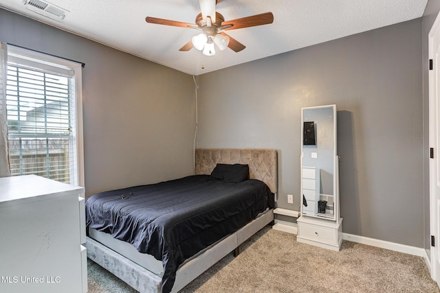 9821 Morgan Manor Dr, Olive Branch, MS 38654 - bedroom featuring light carpet and ceiling fan