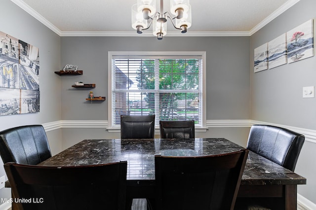 9821 Morgan Manor Dr, Olive Branch, MS 38654 - dining area featuring a chandelier and ornamental molding