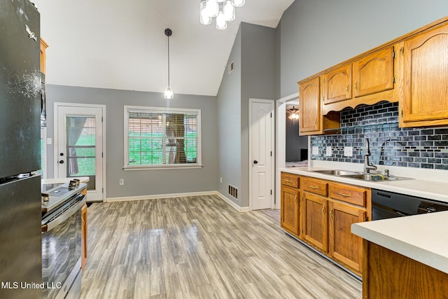 9821 Morgan Manor Dr, Olive Branch, MS 38654 - kitchen featuring stainless steel electric stove, high vaulted ceiling, light countertops, decorative backsplash, and light wood-type flooring