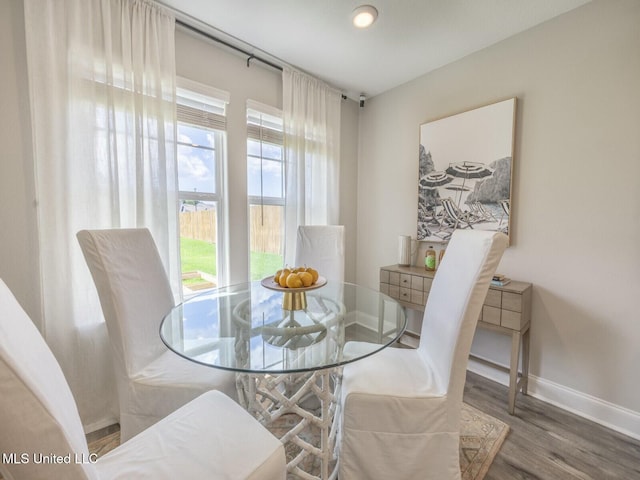 9626 W Oaklawn Rd, Biloxi, MS 39532 - dining room featuring baseboards and wood finished floors
