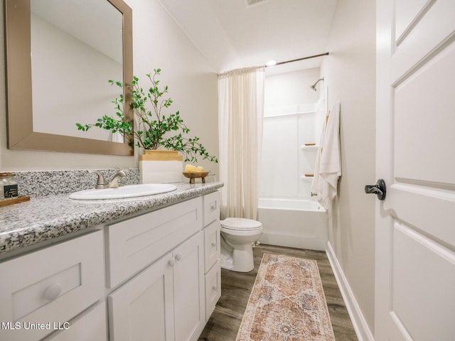 9626 W Oaklawn Rd, Biloxi, MS 39532 - bathroom featuring vanity, wood finished floors, and shower / bath combo with shower curtain