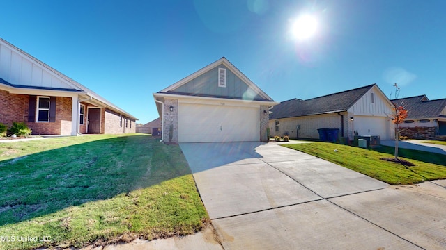 7876 Gardendale Dr, Olive Branch, MS 38654 - ranch-style house with brick siding, board and batten siding, and a front yard