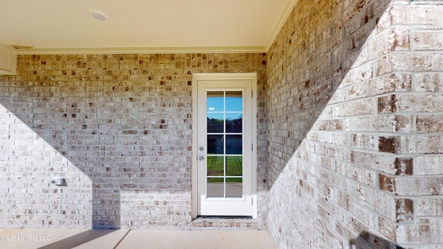 7876 Gardendale Dr, Olive Branch, MS 38654 - property entrance with brick siding