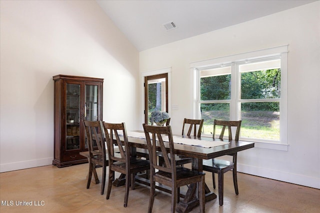 335 Aaron Rd, Sarah, MS 38665 - dining room featuring high vaulted ceiling and baseboards