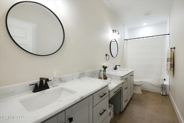 335 Aaron Rd, Sarah, MS 38665 - bathroom with vanity, toilet, baseboards, concrete floors, and recessed lighting