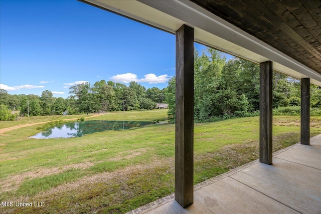 335 Aaron Rd, Sarah, MS 38665 - view of green lawn with a water view and a patio