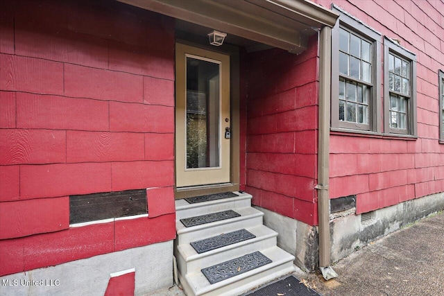 doorway to property featuring crawl space