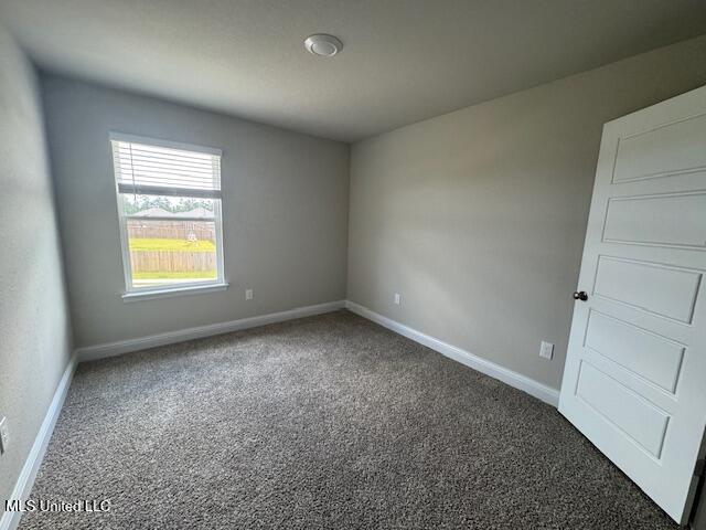 5378 Leeds Ln, Biloxi, MS 39532 - carpeted empty room featuring baseboards