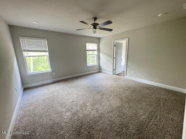 5378 Leeds Ln, Biloxi, MS 39532 - carpeted spare room featuring baseboards and ceiling fan