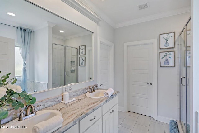 bathroom with vanity, tile patterned floors, ornamental molding, and walk in shower