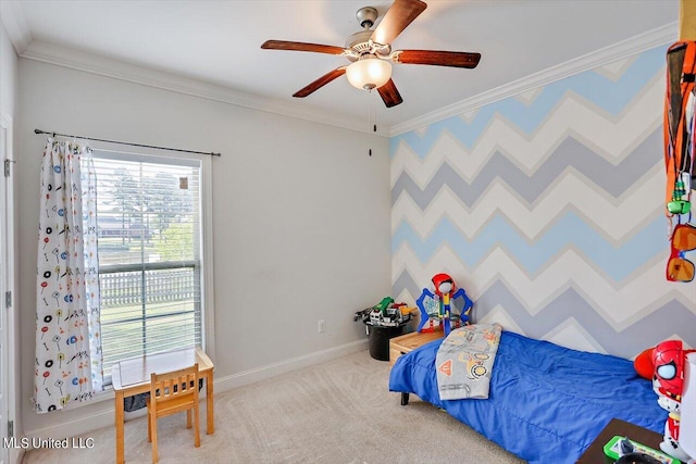 carpeted bedroom featuring ceiling fan and ornamental molding