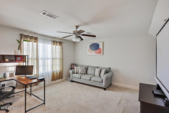 carpeted living room featuring lofted ceiling and ceiling fan