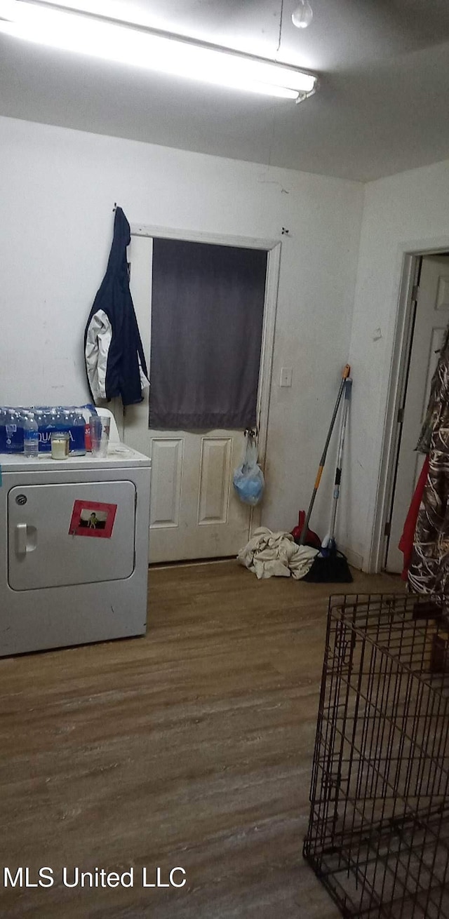 20454 Saucier Advance Rd, Saucier, MS 39574 - washroom featuring laundry area, washer / dryer, and wood finished floors