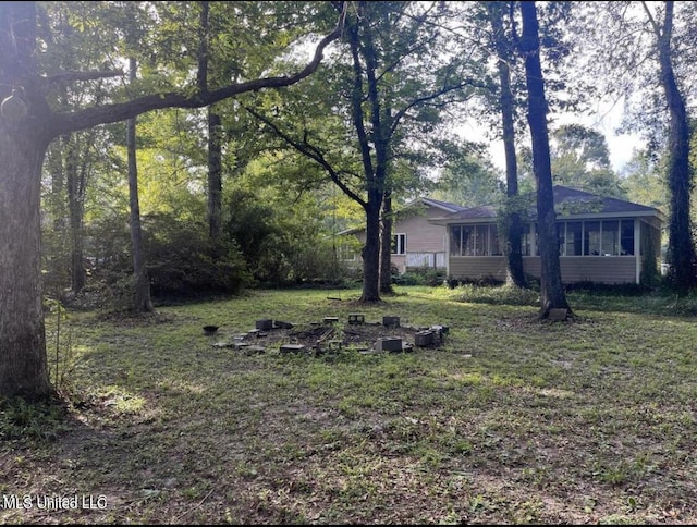 20454 Saucier Advance Rd, Saucier, MS 39574 - view of yard with a sunroom