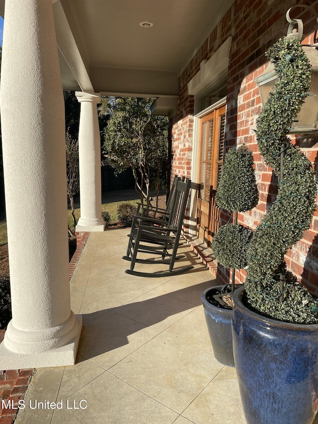 view of patio featuring covered porch