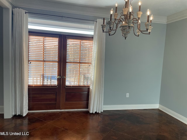 unfurnished dining area with crown molding, dark tile patterned floors, french doors, and a notable chandelier