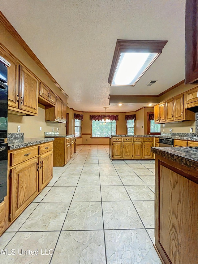 kitchen featuring light tile patterned floors, a textured ceiling, stainless steel dishwasher, crown molding, and an inviting chandelier