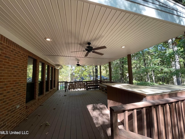 wooden deck with ceiling fan