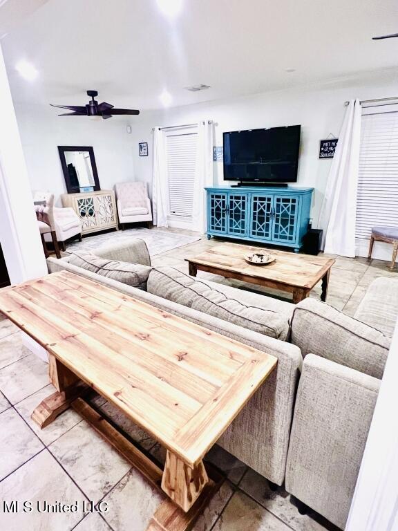 living room with ceiling fan