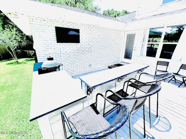 view of patio / terrace featuring a wooden deck