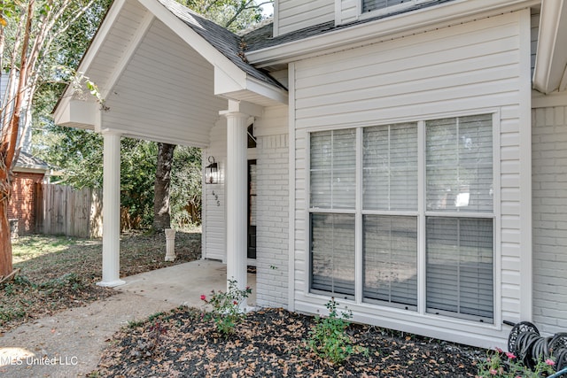 property entrance featuring a patio