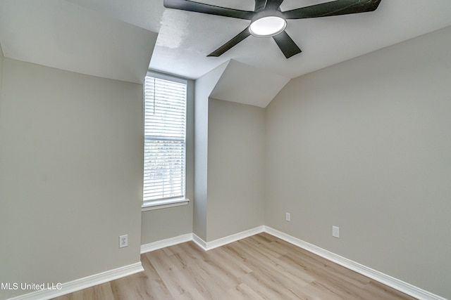 bonus room featuring light hardwood / wood-style floors, lofted ceiling, plenty of natural light, and ceiling fan