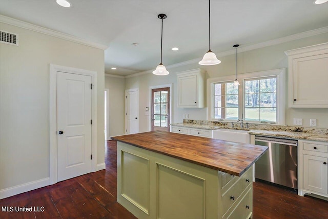 kitchen with hanging light fixtures, a kitchen island, dishwasher, dark hardwood / wood-style floors, and wooden counters