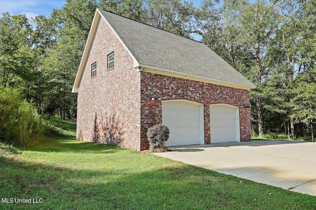 view of side of property with a lawn