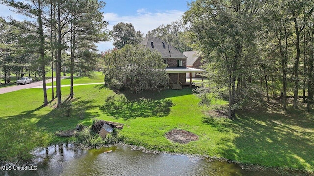 exterior space featuring a water view