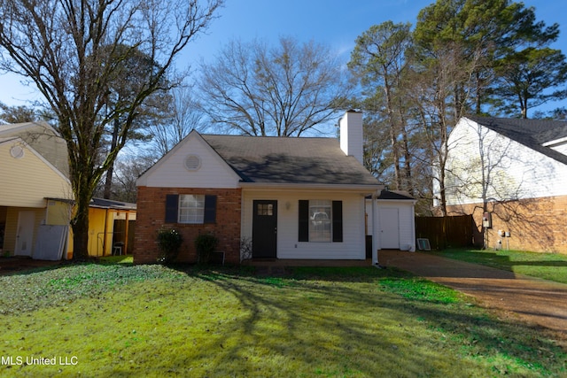 view of front of home featuring a garage and a front yard