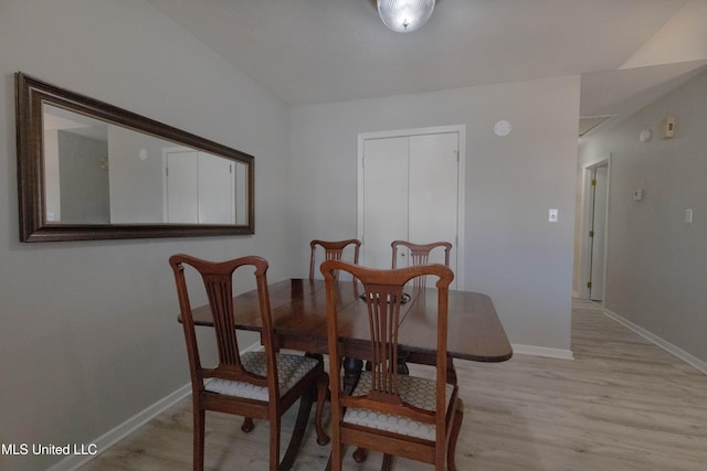 dining area with light hardwood / wood-style floors