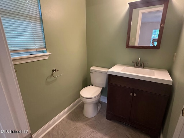 6 Dogwood Cir, Diamondhead, MS 39525 - half bathroom with vanity, toilet, and baseboards