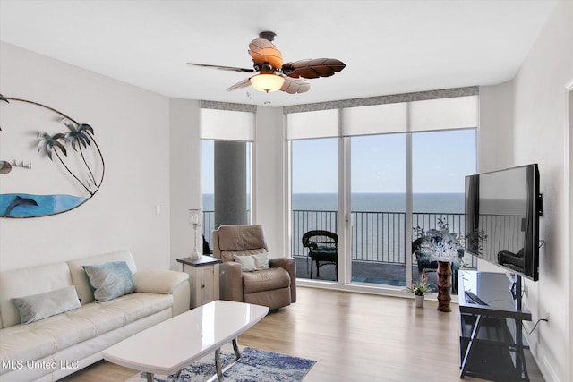 2668 Beach Blvd Unit 1405, Biloxi, MS 39531 - living room with light wood-style flooring and a ceiling fan
