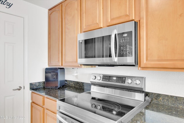 2668 Beach Blvd Unit 1405, Biloxi, MS 39531 - kitchen featuring appliances with stainless steel finishes and light brown cabinetry