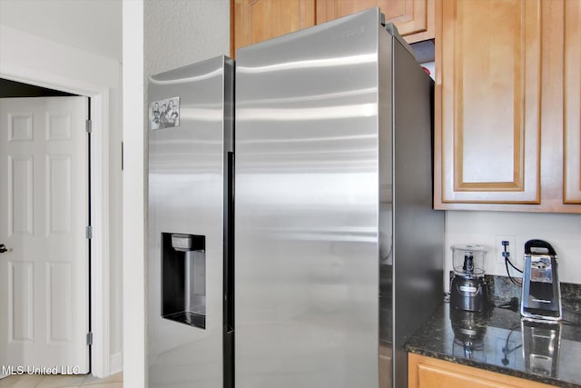 2668 Beach Blvd Unit 1405, Biloxi, MS 39531 - kitchen with stainless steel refrigerator with ice dispenser and dark stone counters