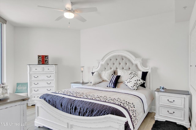 2668 Beach Blvd Unit 1405, Biloxi, MS 39531 - bedroom with light wood finished floors and a ceiling fan