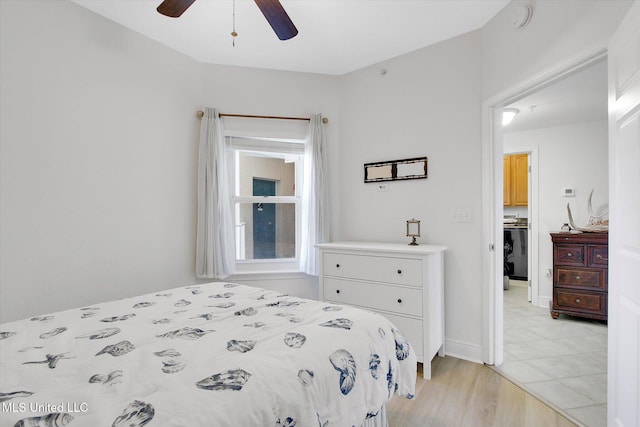2668 Beach Blvd Unit 1405, Biloxi, MS 39531 - bedroom with light wood-style flooring and ceiling fan