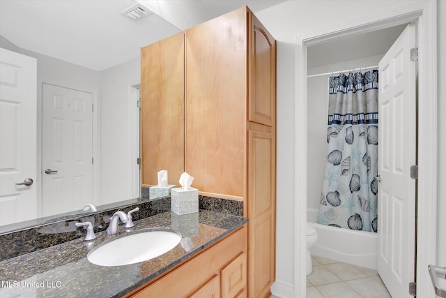 2668 Beach Blvd Unit 1405, Biloxi, MS 39531 - bathroom featuring tile patterned flooring, vanity, shower / tub combo with curtain, and toilet