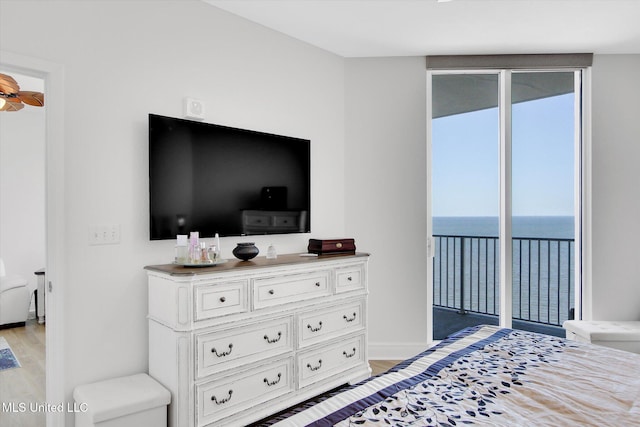2668 Beach Blvd Unit 1405, Biloxi, MS 39531 - bedroom with access to exterior and light wood-style floors
