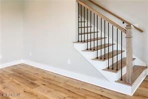0 N Daytona Dr, Pearlington, MS 39572 - stairs with wood finished floors and baseboards