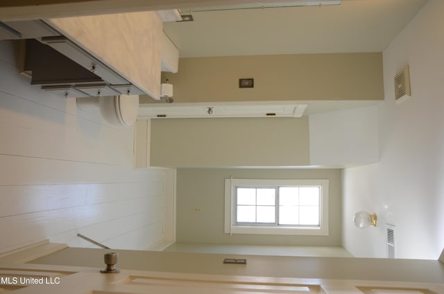 kitchen featuring light countertops and visible vents