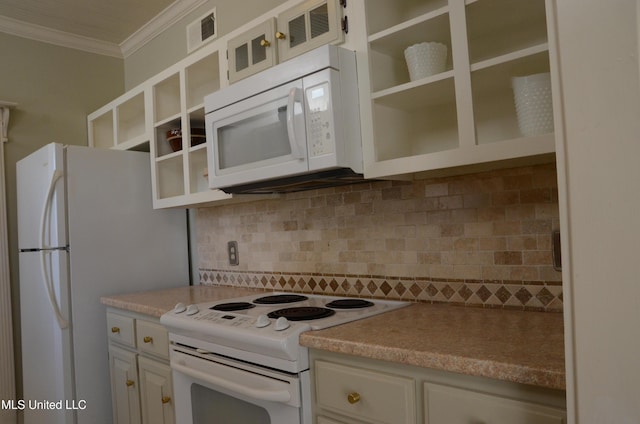 kitchen with white appliances, light countertops, crown molding, and decorative backsplash