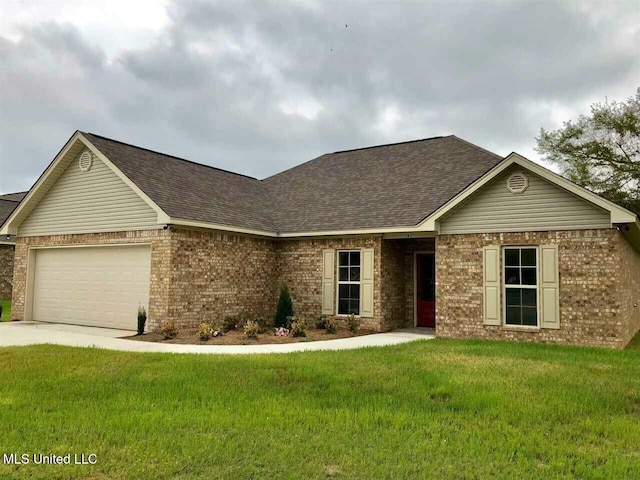 single story home featuring a front yard and a garage