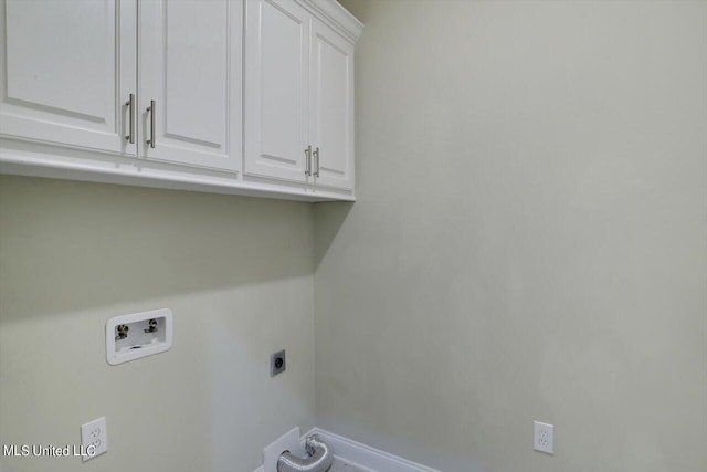 laundry area featuring cabinets, hookup for an electric dryer, and washer hookup