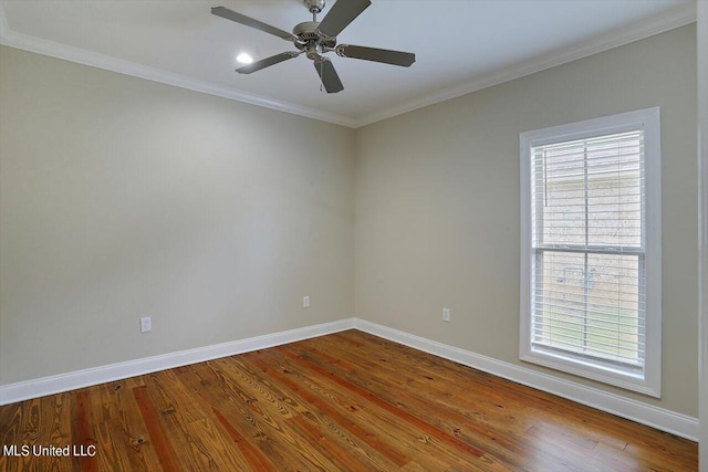 unfurnished room featuring ornamental molding, wood-type flooring, and ceiling fan