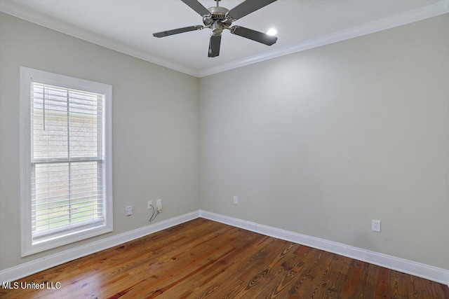 empty room featuring ornamental molding, hardwood / wood-style flooring, and ceiling fan