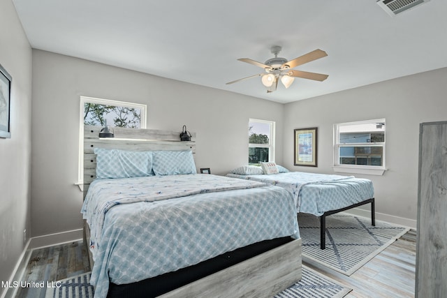 4113 Blue Jay St, Bay Saint Louis, MS 39520 - bedroom featuring hardwood / wood-style flooring and ceiling fan