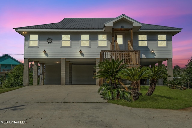 view of front of property with a carport