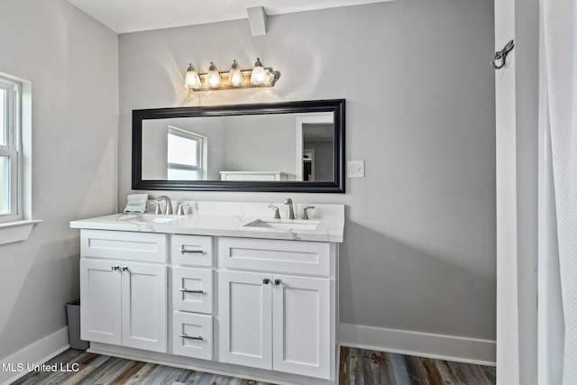 4113 Blue Jay St, Bay Saint Louis, MS 39520 - bathroom featuring vanity and wood-type flooring