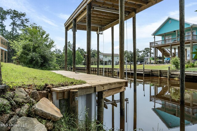4113 Blue Jay St, Bay Saint Louis, MS 39520 - view of dock featuring a water view